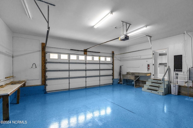 garage featuring a garage door opener