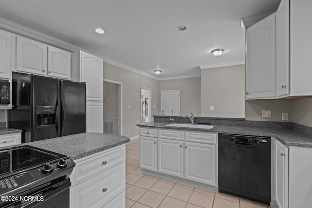 kitchen featuring black appliances, light tile patterned flooring, ornamental molding, and white cabinets