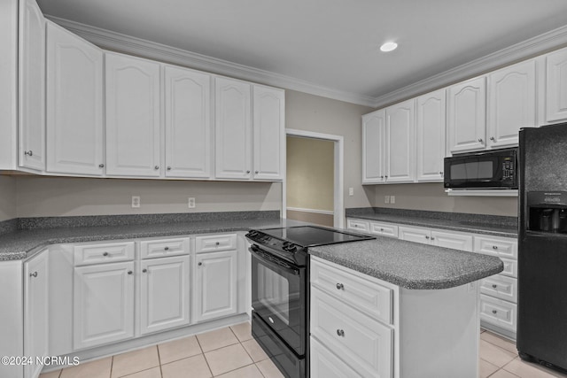 kitchen with ornamental molding, light tile patterned floors, black appliances, and white cabinetry