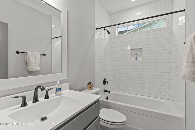 full bathroom with shower / tub combination, vanity, and toilet