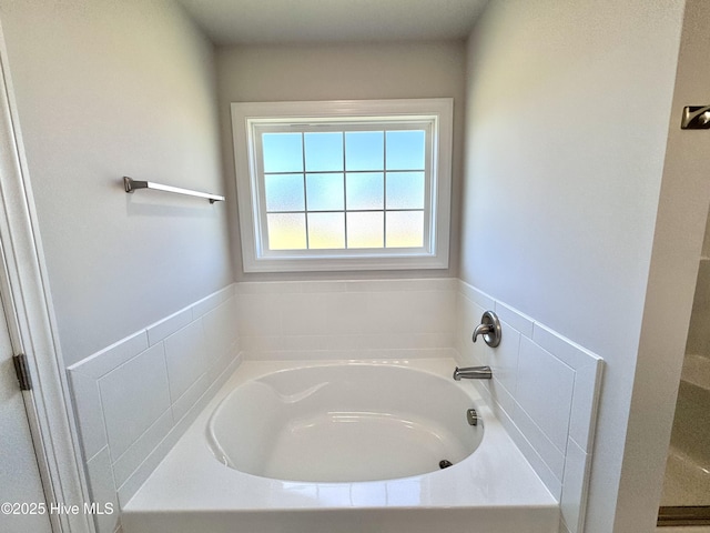 full bathroom featuring a garden tub