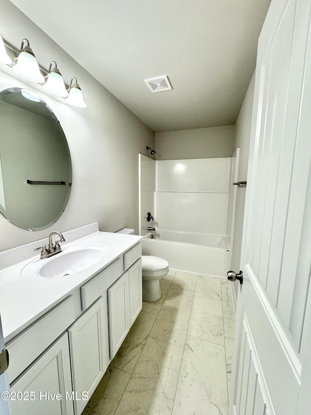 bathroom featuring marble finish floor, shower / bathtub combination, visible vents, toilet, and vanity