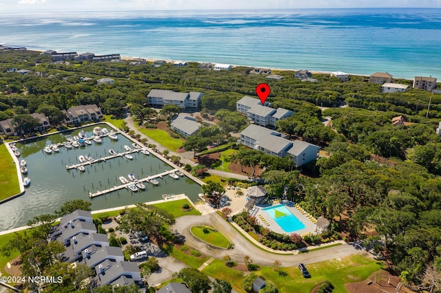 bird's eye view with a water view