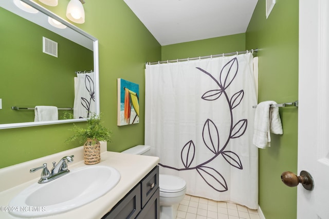 bathroom featuring visible vents, a shower with shower curtain, toilet, tile patterned flooring, and vanity