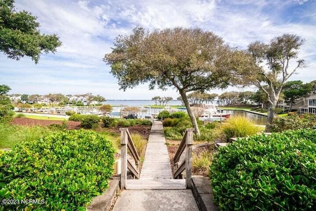 view of home's community featuring a water view