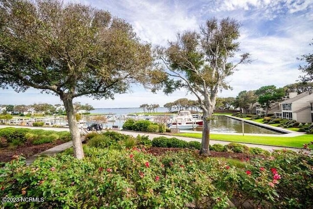 view of home's community featuring a water view