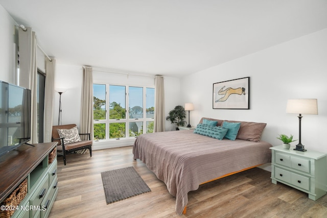 bedroom with light wood-style floors