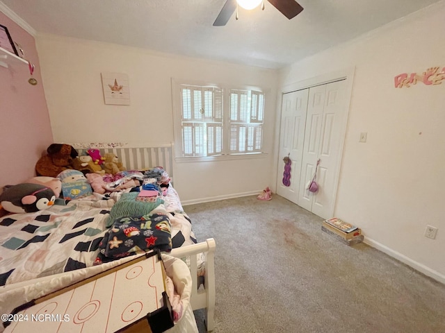 unfurnished bedroom featuring a closet, ceiling fan, and light colored carpet