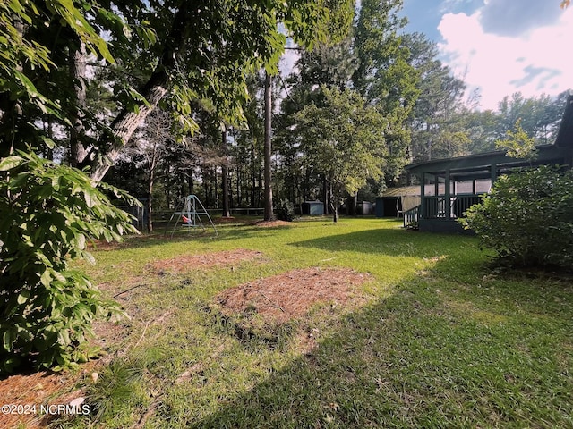 view of yard with a playground