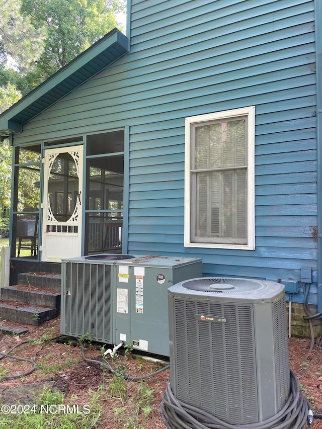 exterior space with central air condition unit