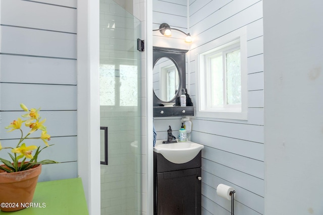 511 N A St, Bridgeton, NC 28519 - bathroom featuring vanity and wood walls