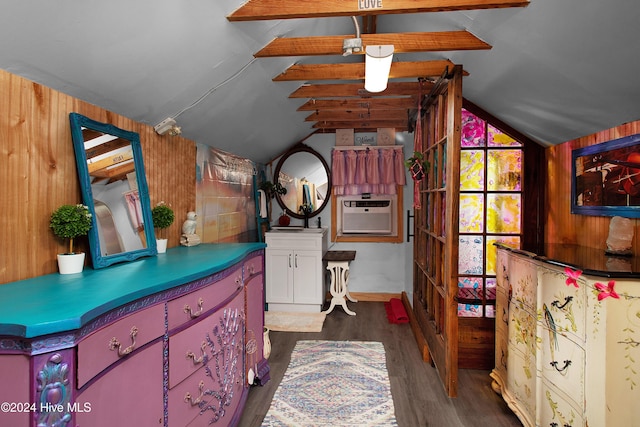 511 N A St, Bridgeton, NC 28519 - bedroom featuring lofted ceiling, cooling unit, dark wood-type flooring, and wooden walls