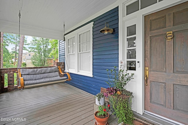 wooden deck featuring a porch