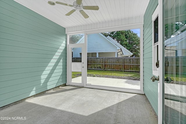 5972 Gray Squirrel Path, Southport, NC 28461 - unfurnished sunroom with ceiling fan