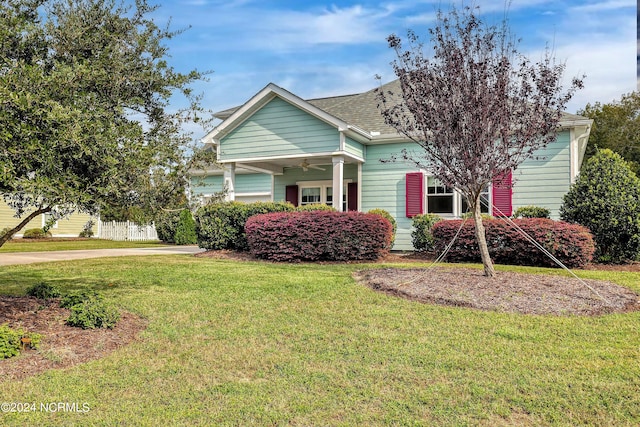 view of front of home with a front yard