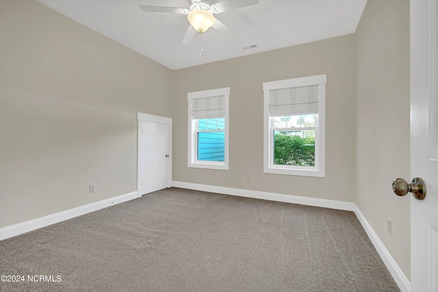 5972 Gray Squirrel Path, Southport, NC 28461 - carpeted spare room featuring ceiling fan and baseboards