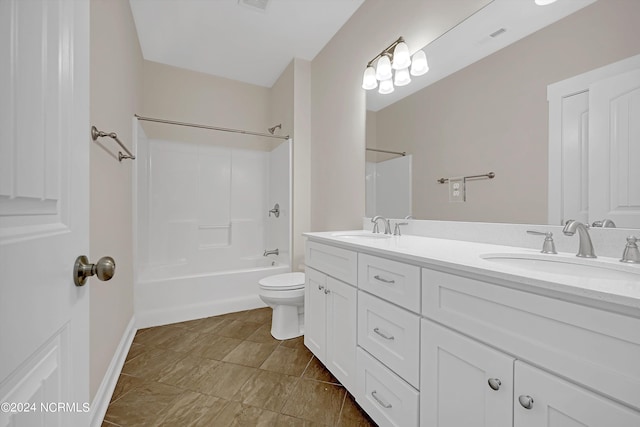 full bathroom featuring  shower combination, vanity, and toilet