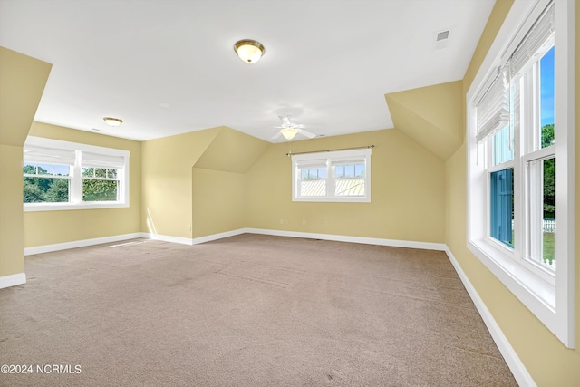 5972 Gray Squirrel Path, Southport, NC 28461 - additional living space featuring carpet flooring, lofted ceiling, baseboards, and a ceiling fan