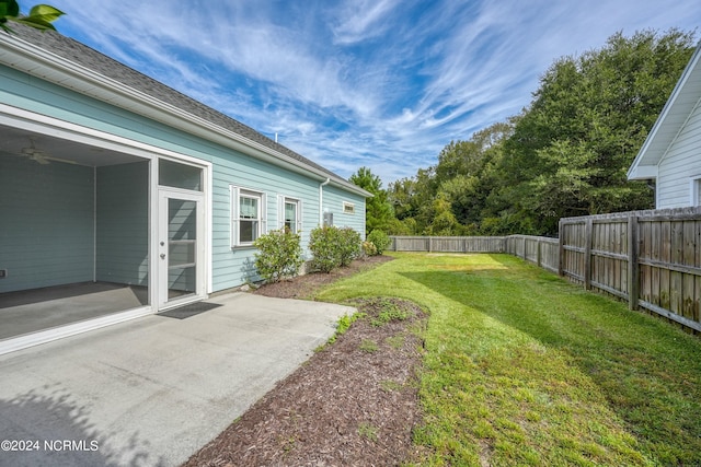 view of yard with a patio area