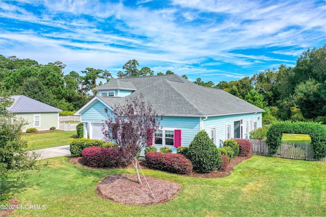 5972 Gray Squirrel Path, Southport, NC 28461 - view of front facade with a garage and a shingled roof