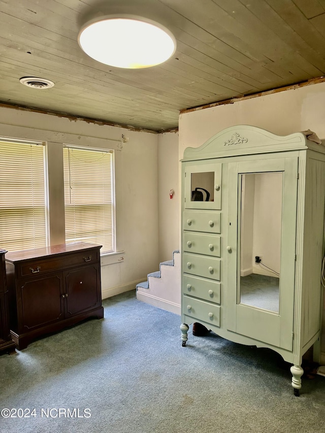 interior space featuring wood ceiling