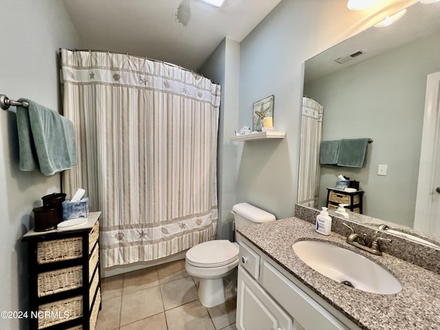 full bathroom featuring shower / tub combo, vanity, toilet, and tile patterned flooring