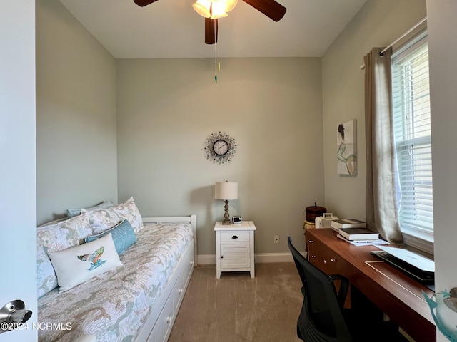 carpeted bedroom with ceiling fan