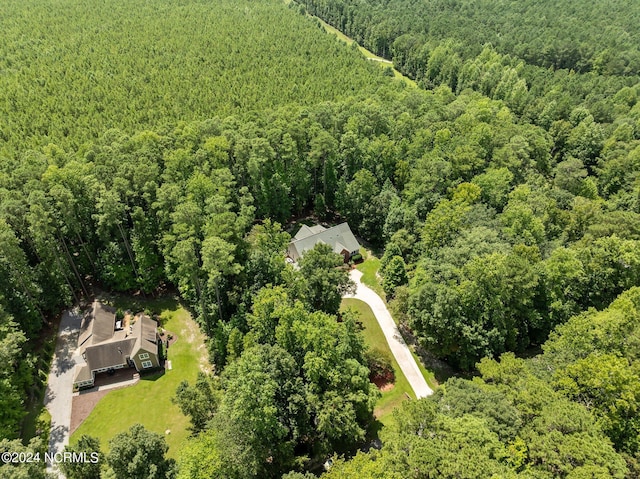 bird's eye view featuring a forest view