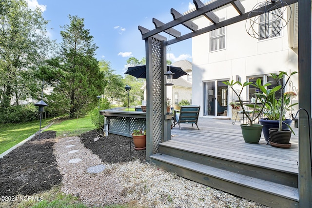 wooden deck with a pergola