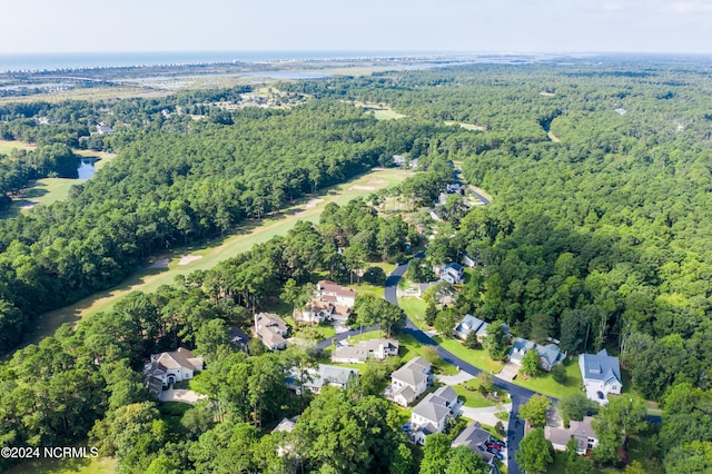 birds eye view of property with a residential view and a forest view