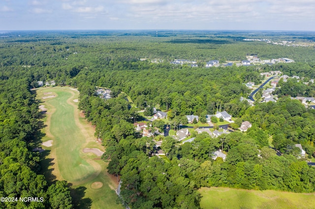 bird's eye view with a forest view and golf course view