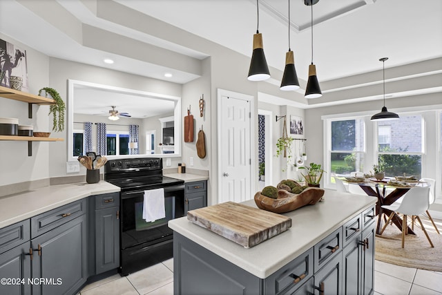 kitchen with light countertops, gray cabinets, black range with electric cooktop, and open shelves