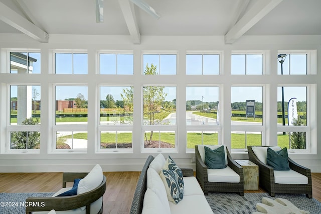 sunroom with beam ceiling