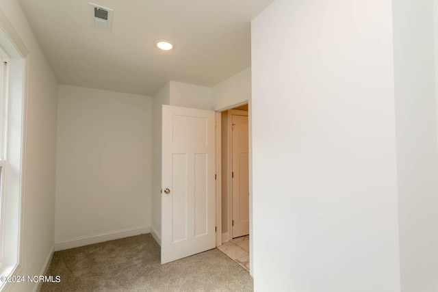 interior space with light colored carpet