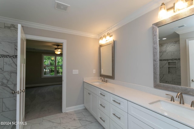 bathroom with crown molding and vanity