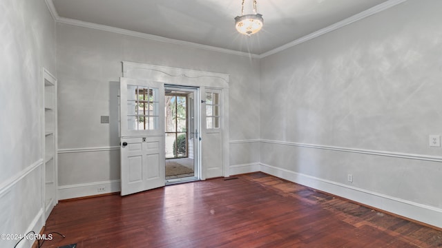 foyer entrance featuring dark hardwood / wood-style flooring and ornamental molding