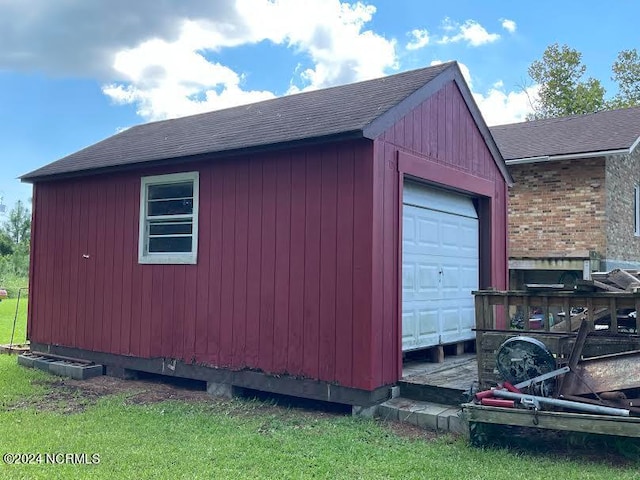 view of outbuilding featuring a garage