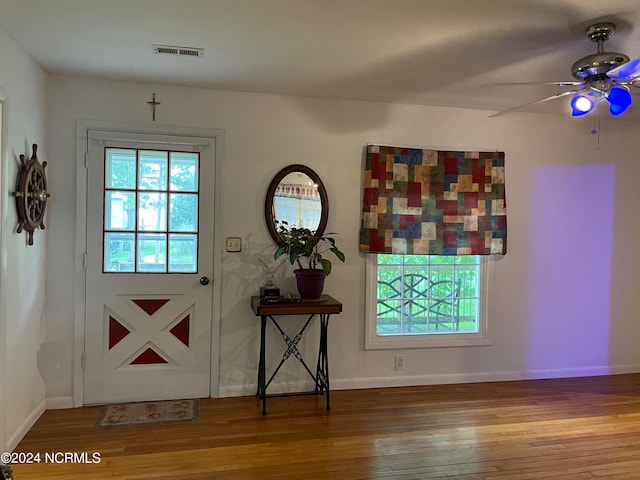 entryway with ceiling fan and hardwood / wood-style flooring