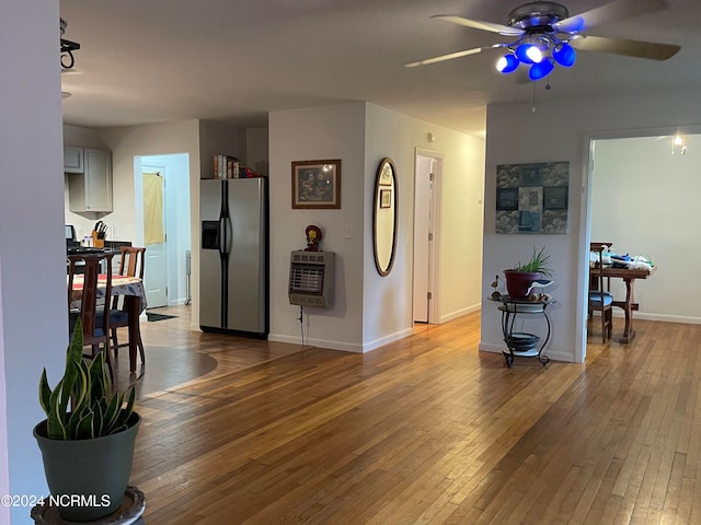 interior space featuring ceiling fan and light hardwood / wood-style floors