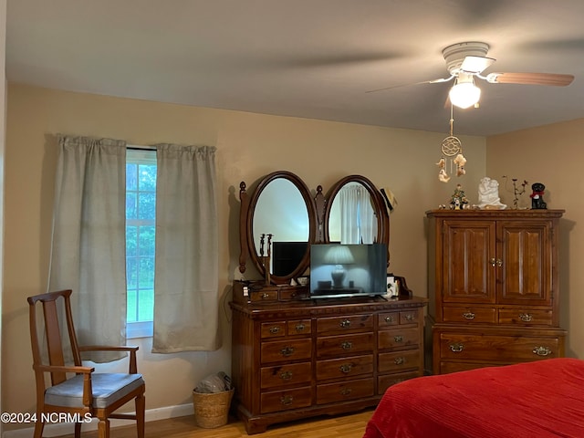 bedroom featuring ceiling fan and light wood-type flooring