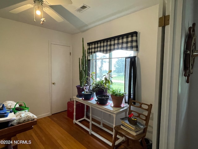 interior space with hardwood / wood-style floors and ceiling fan