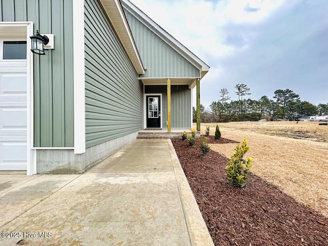 doorway to property featuring a garage