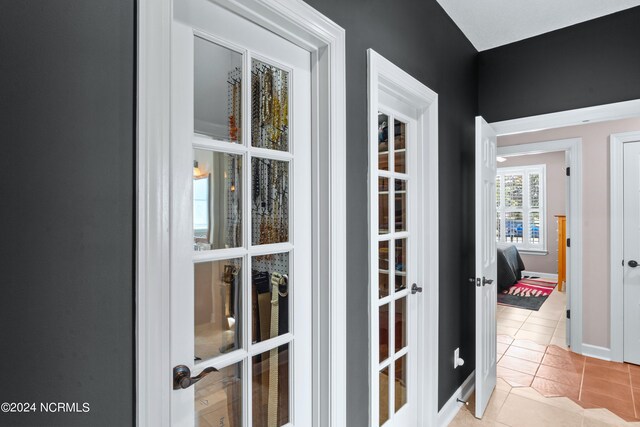 interior space featuring light tile patterned floors