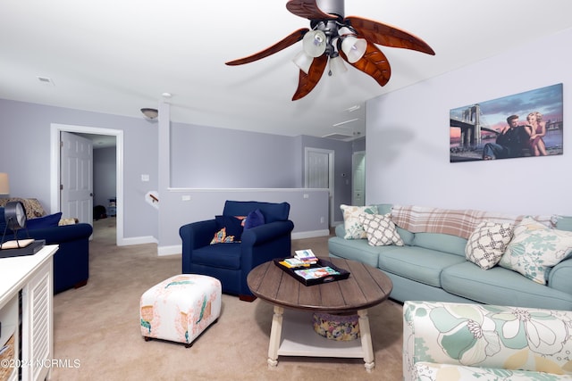 living room with light carpet and ceiling fan