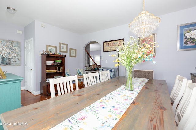 dining area featuring a chandelier