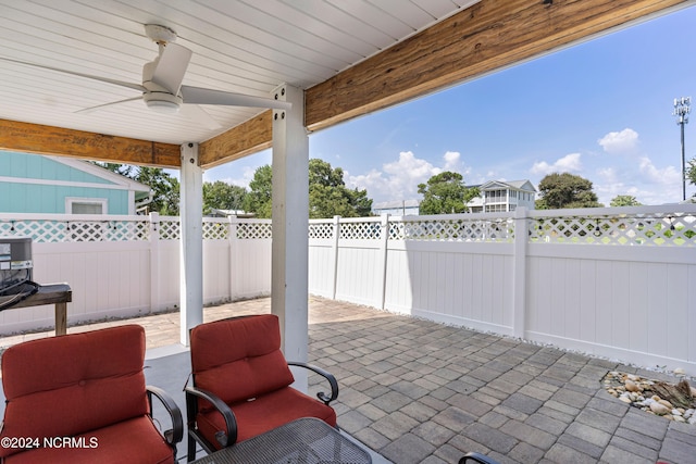 view of patio / terrace featuring ceiling fan