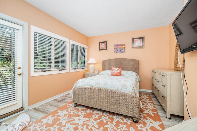 bedroom with light wood-type flooring