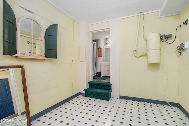 bathroom with crown molding