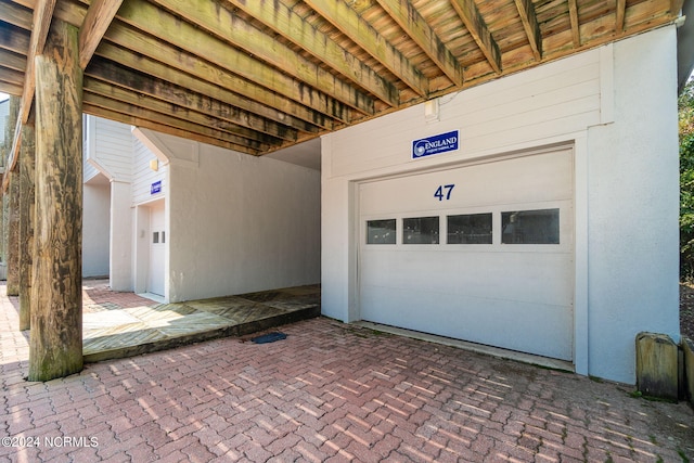 view of patio / terrace with a garage