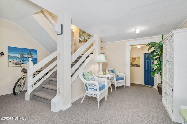 interior space featuring carpet floors and vaulted ceiling